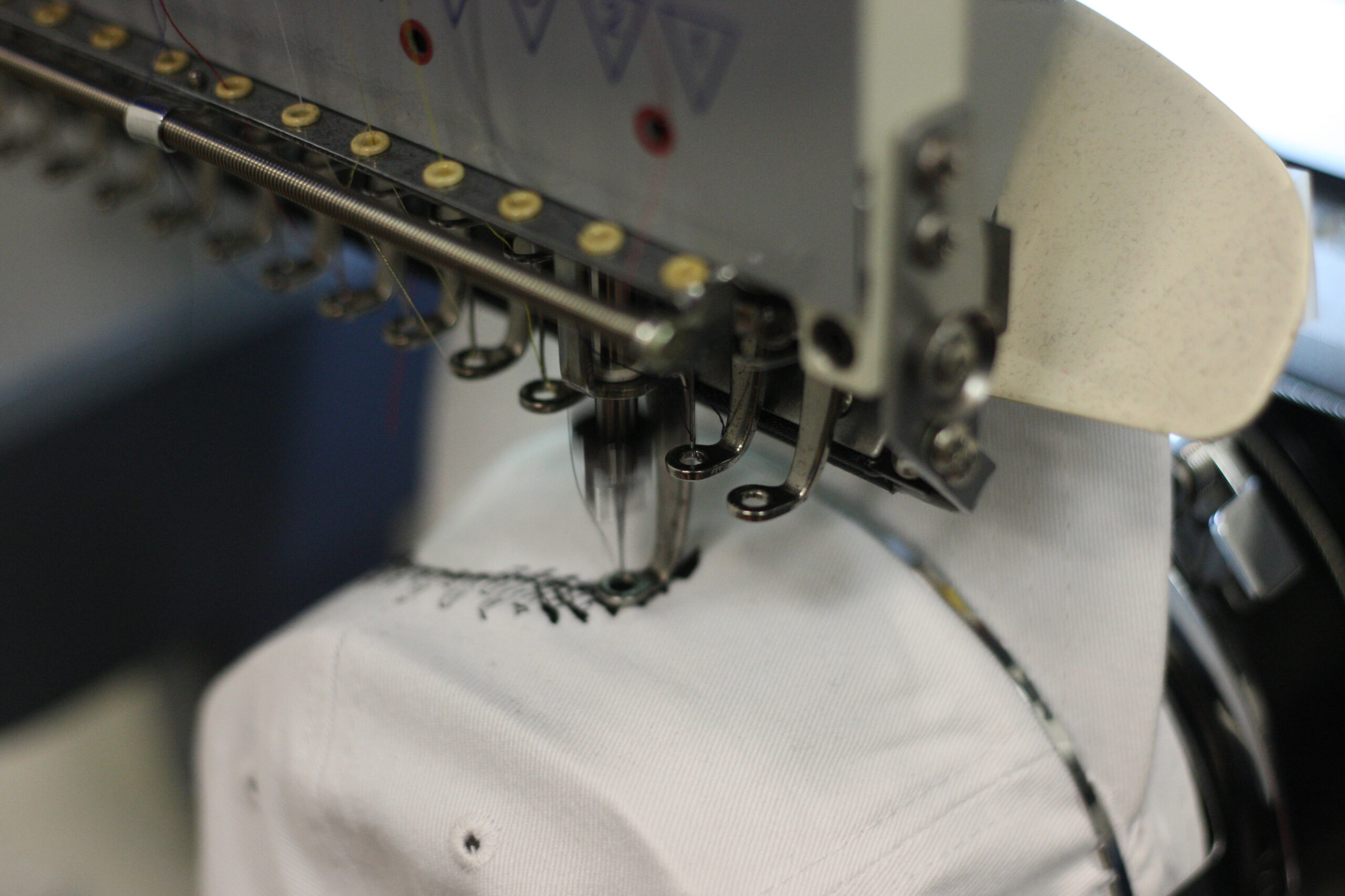 Industrial embroidery machine in action